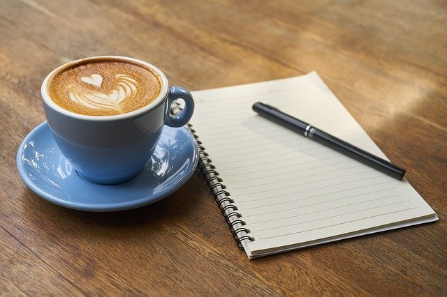 decorative image of notebook and cup of coffee
